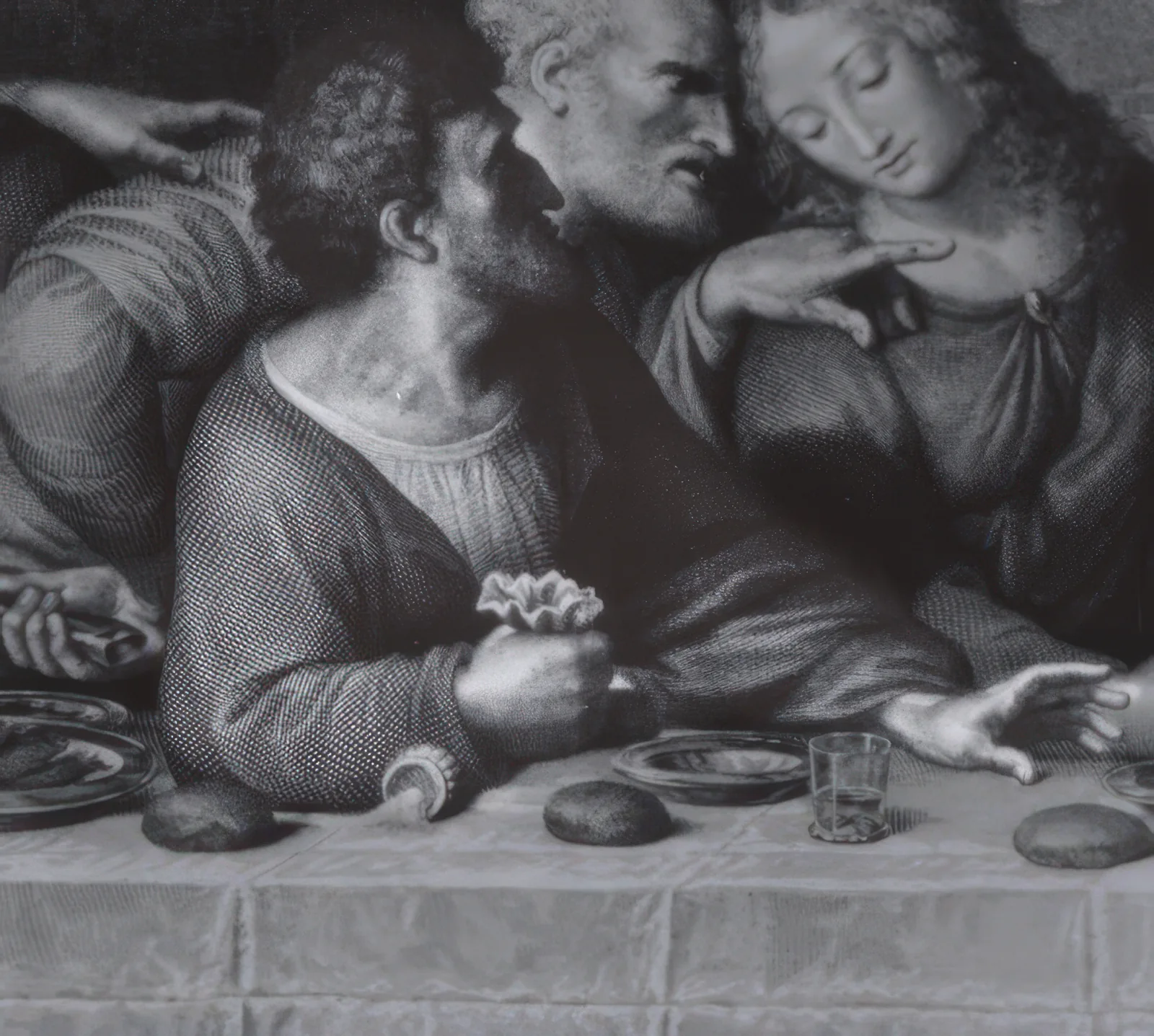 A detail from the engraving showing three figures at the table. The nearest leans back with a small bag gripped in his fist, a bearded man behind him leans in to speak, and a third figure sits with lowered eyes.