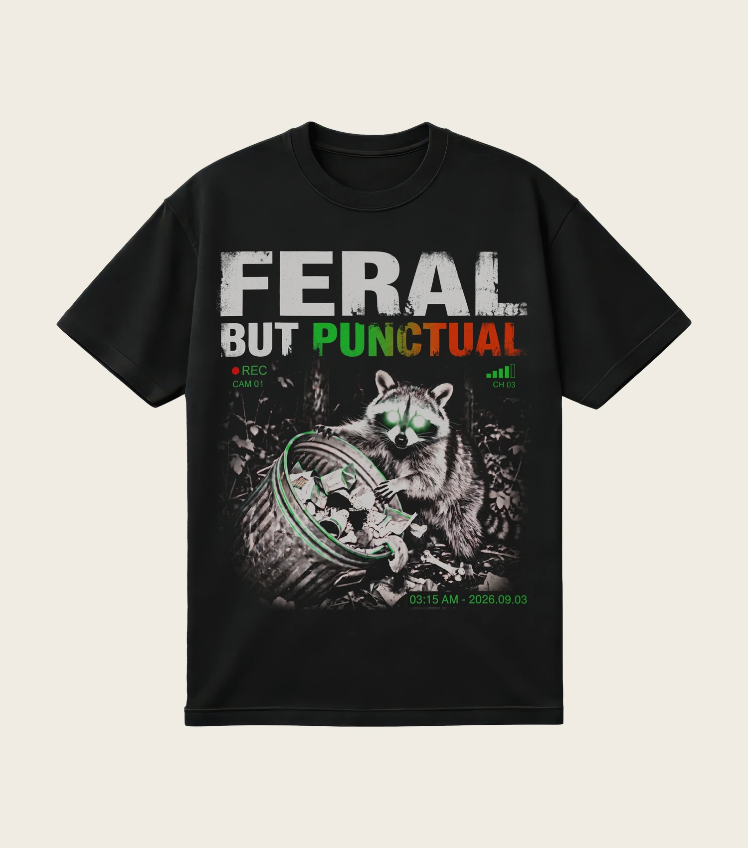 Feral but Punctual printed on a black t-shirt, laid flat