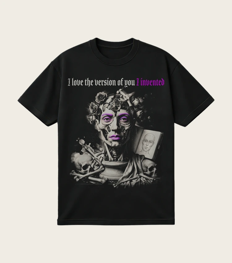 I Love the Version of You I Invented printed on a black t-shirt, laid flat