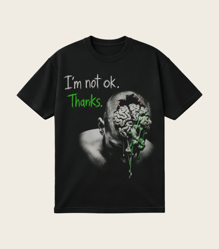 I'm Not OK. Thanks. printed on a black t-shirt, laid flat