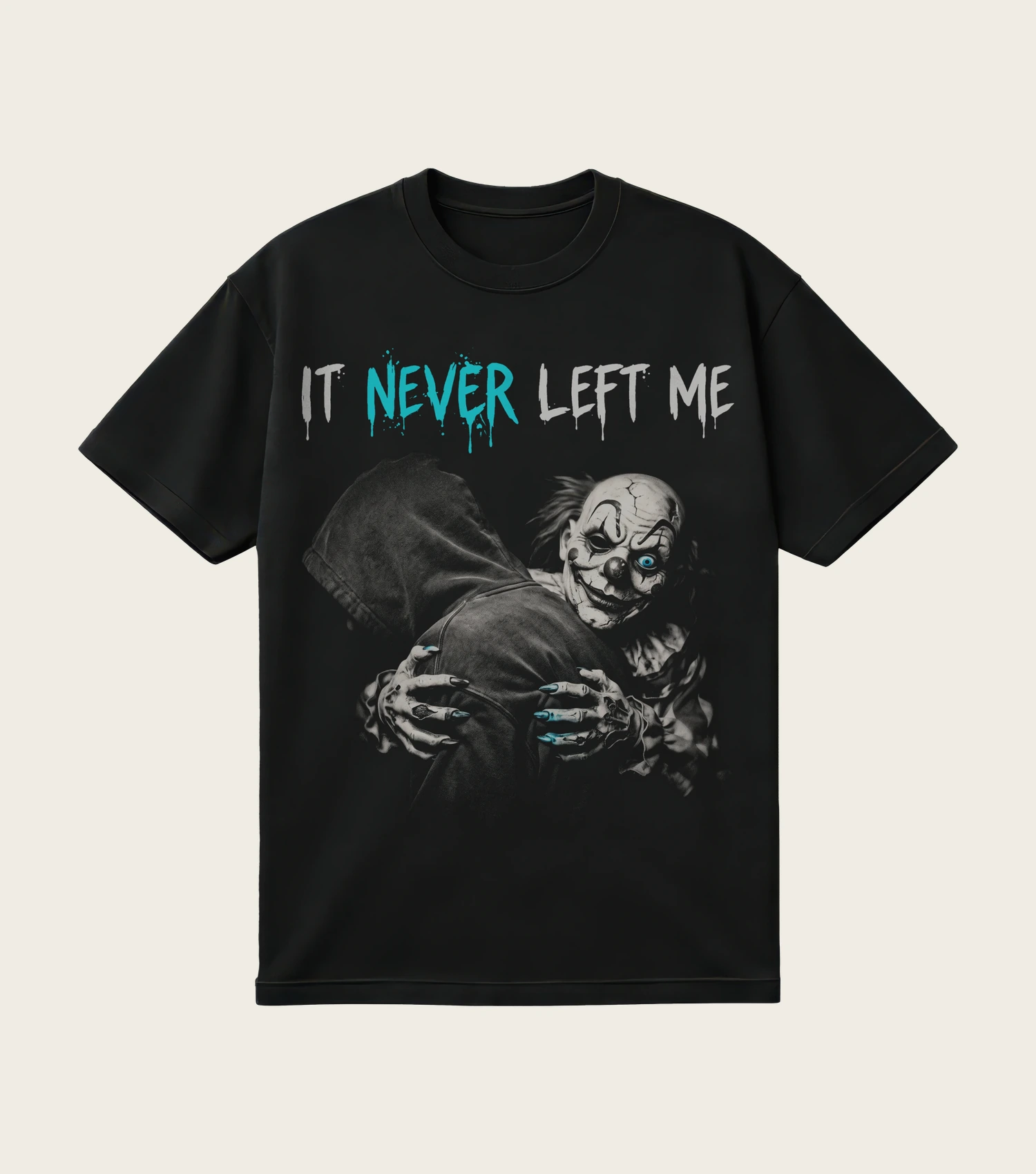 It Never Left Me printed on a black t-shirt, laid flat